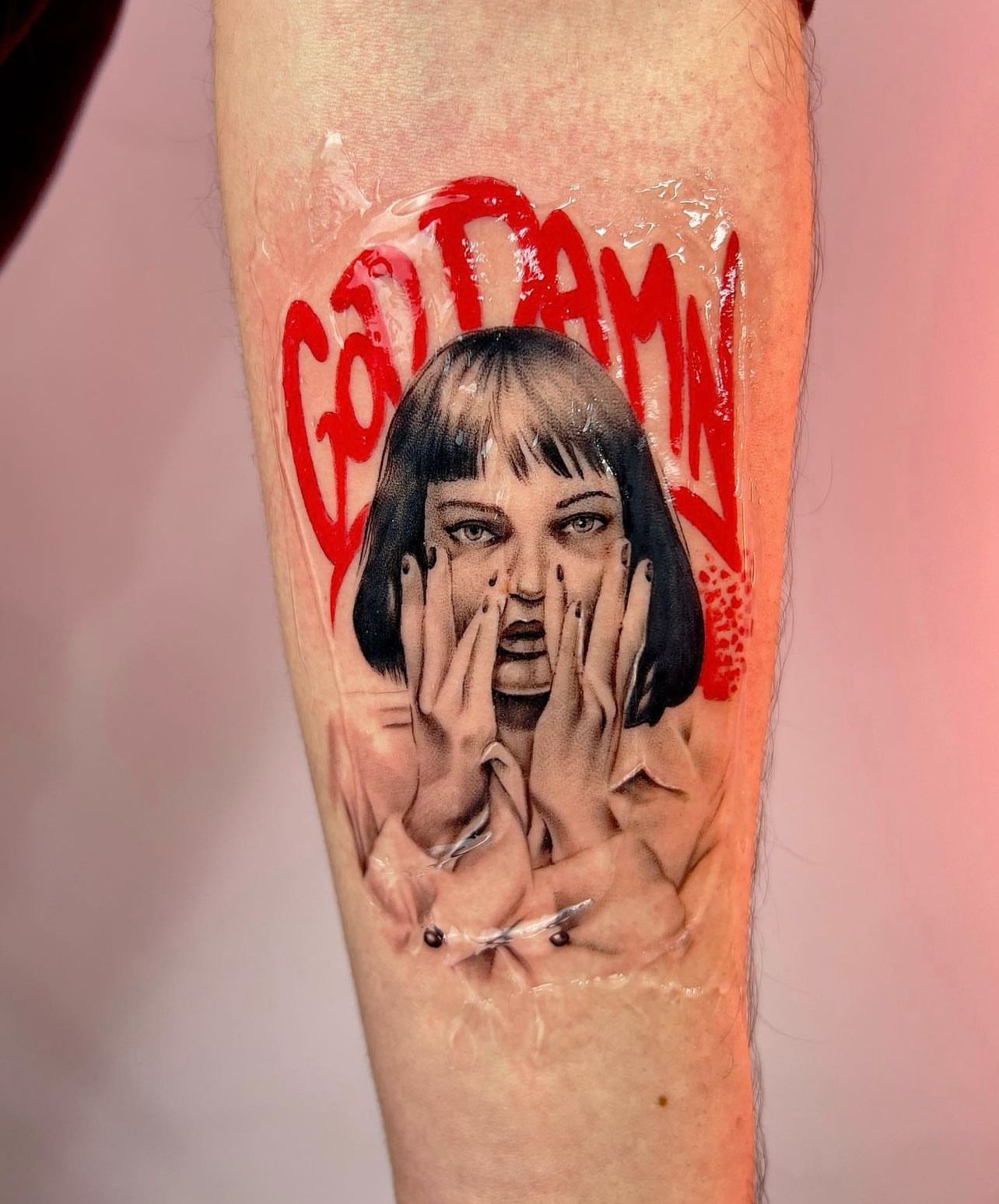 Pulp Fiction inspired tattoo with red text