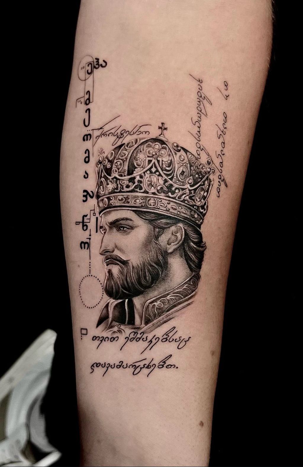 Georgian king portrait tattoo with script text