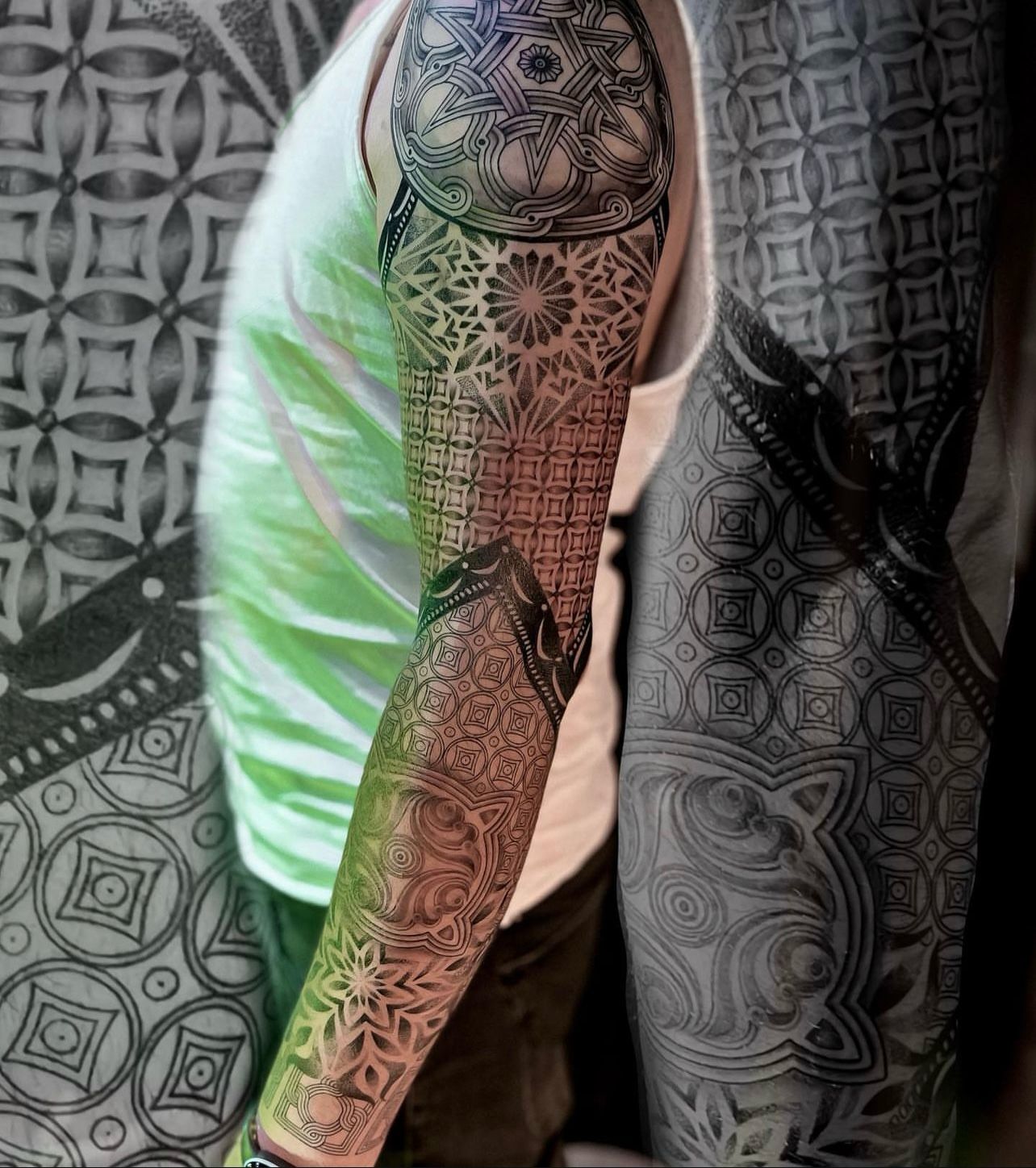 Geometric sleeve tattoo with intricate patterns