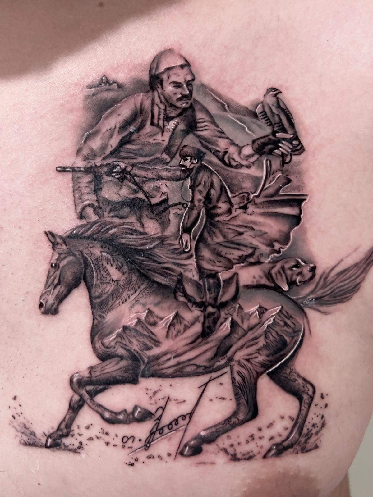 Georgian horseman tattoo with detailed mountain scene